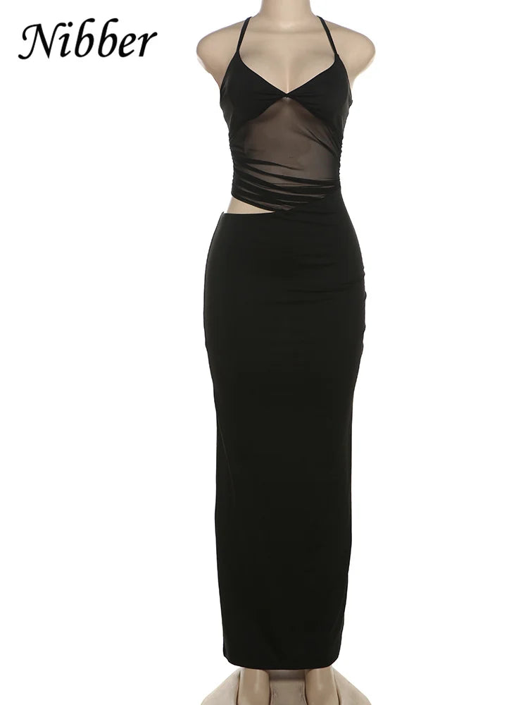 Vestido Longo Preto de Malha com Costas Abertas e Detalhes Vazados – Justo e Elástico