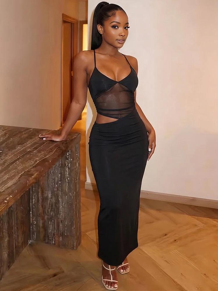 Vestido Longo Preto de Malha com Costas Abertas e Detalhes Vazados – Justo e Elástico